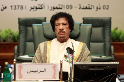 Kaddafi ülkesini terk etmediğini açıkladı