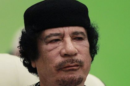 İngiltere ve Kanada Kaddafi'nin mal varlığını dondurdu