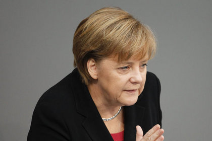 Merkel arada kaldı