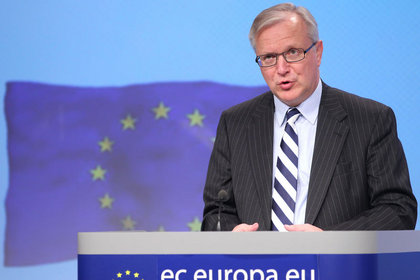 Rehn: S&P'nin tutarsız kararından üzüntü duydum
