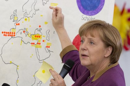 Merkel: Kriz politikası seçimden etkilenmez