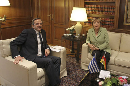 Merkel: Yunanistan'ın euroda kalmasını istiyorum