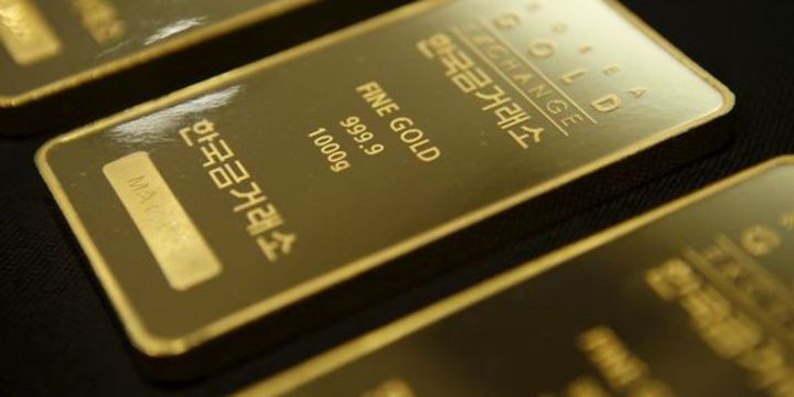 Altın "Fed" beklentileri ile kazancını korudu