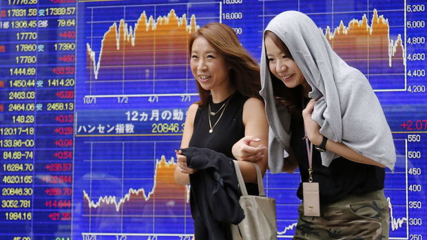 Japonya hisseleri zayıf yen ile yükseldi
