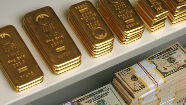 Altın “güçlü dolar” ile üç haftanın zirvesinde tutundu