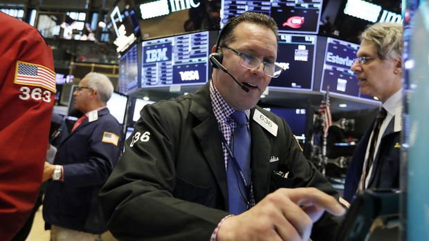 Küresel Piyasalar: Dolar sakin, hisse senetleri yükseldi