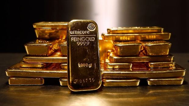Altın 1,400 dolar üzerindeki güçlü seyrini sürdürüyor