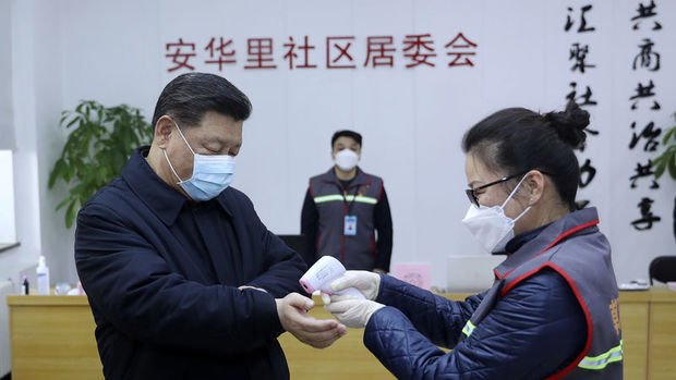 Çin Devlet Başkanı virüsü yeneceklerini söylerken ekonomistler tahminlerini düşürüyor 