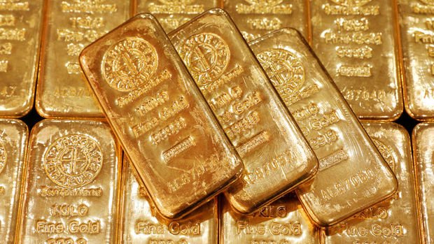 Altın hisse senetlerindeki yükselişle hafif düştü