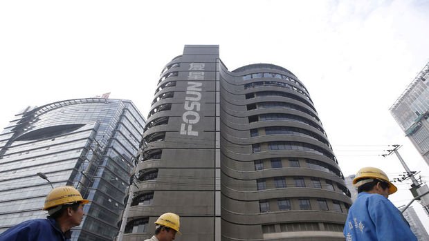 Çin'in en büyük holdinglerinden biri için bankalara mali risk uyarısı
